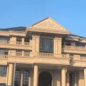 遵义黄金麻别墅外墙干挂石材效果示例