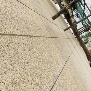 遵义 黄金麻花岗岩荔枝面外墙干挂石材效果示例