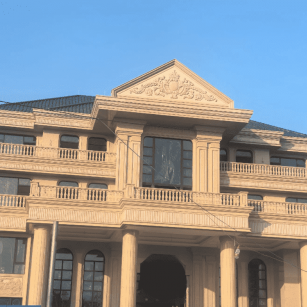 遵义黄金麻别墅外墙干挂石材效果示例